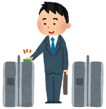 Man passing through a ticket gate using an IC card